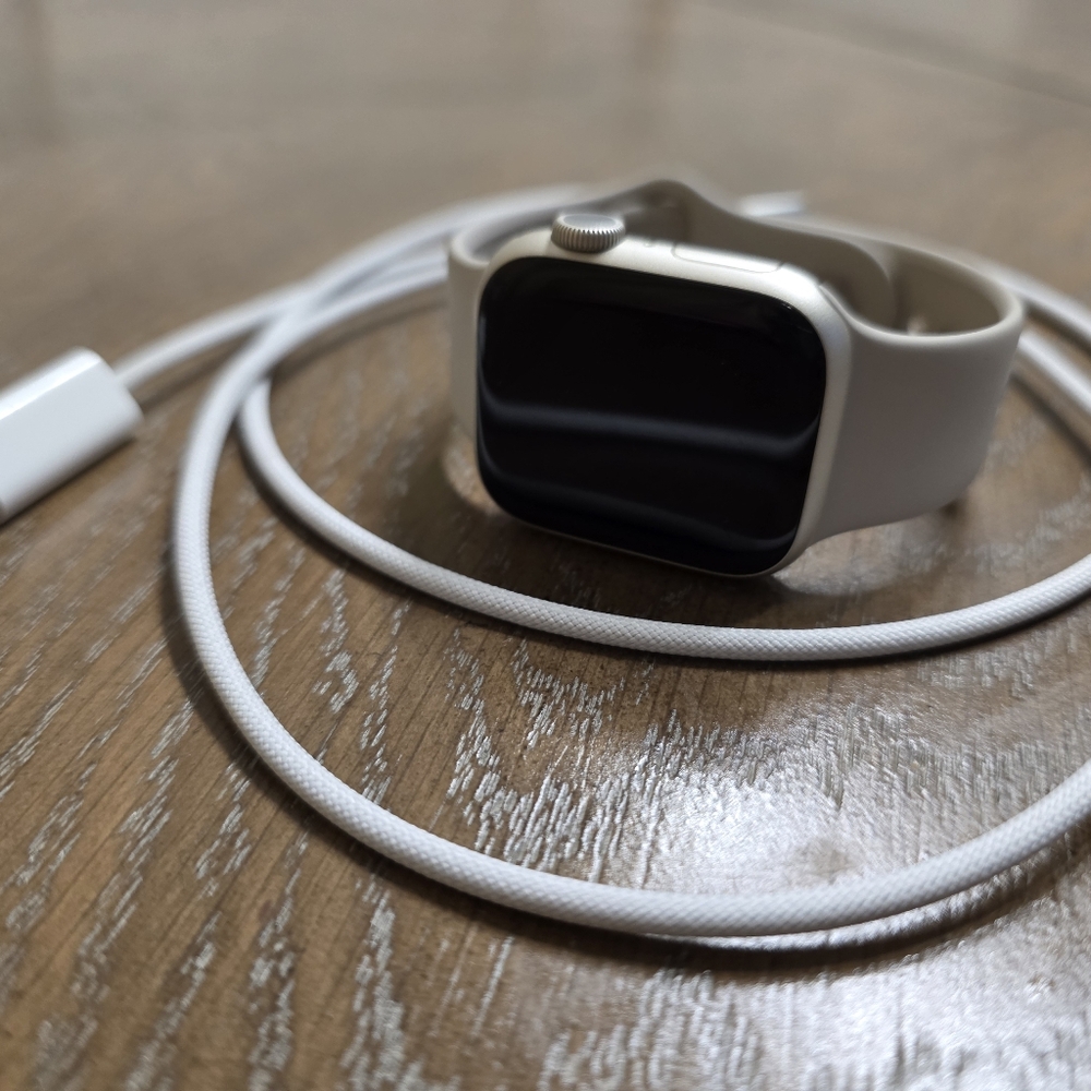 Apple Smartwatch with White Band and Black Display